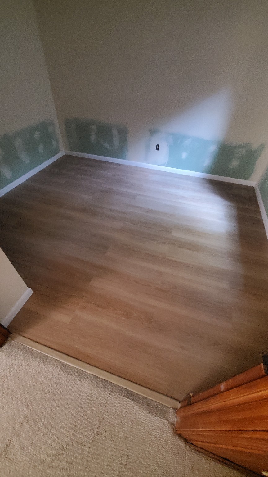 New wood-look flooring and finished steps