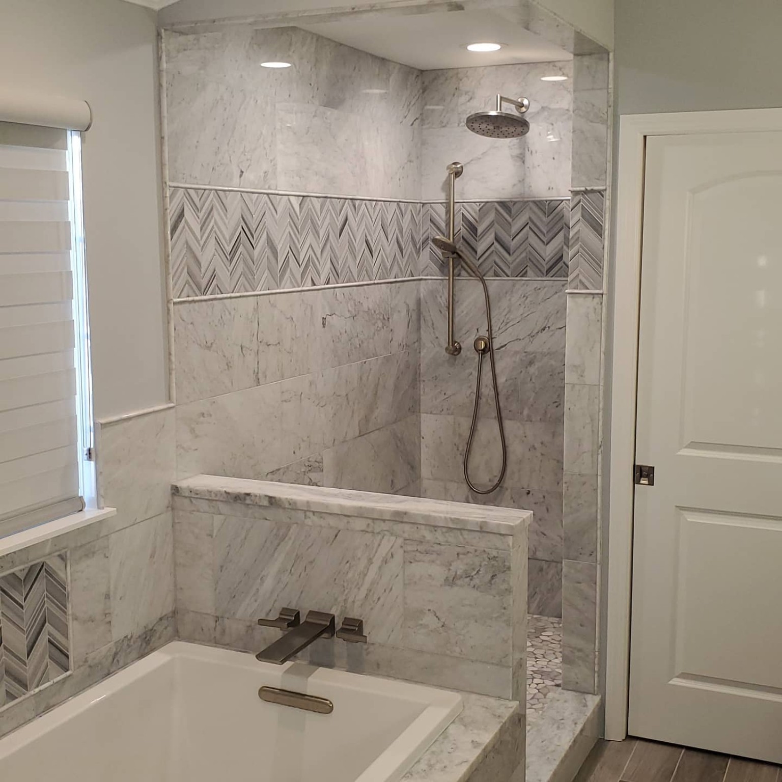Completed custom tiled walk-in shower by SPL Services